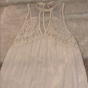 American Eagle Cream blouse with cute cutouts